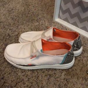 Hey dude shoes size 7! Worn about twice.